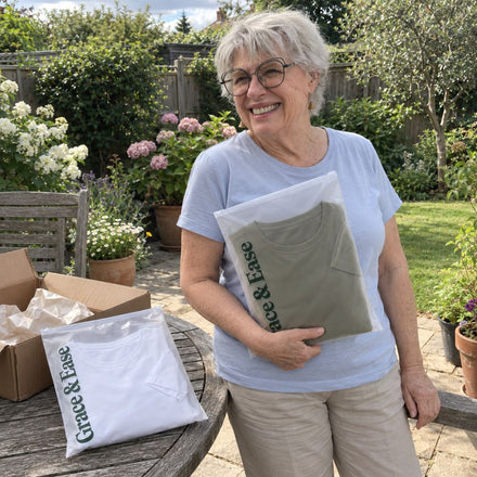 A customer with her Grace & Ease t-shirts